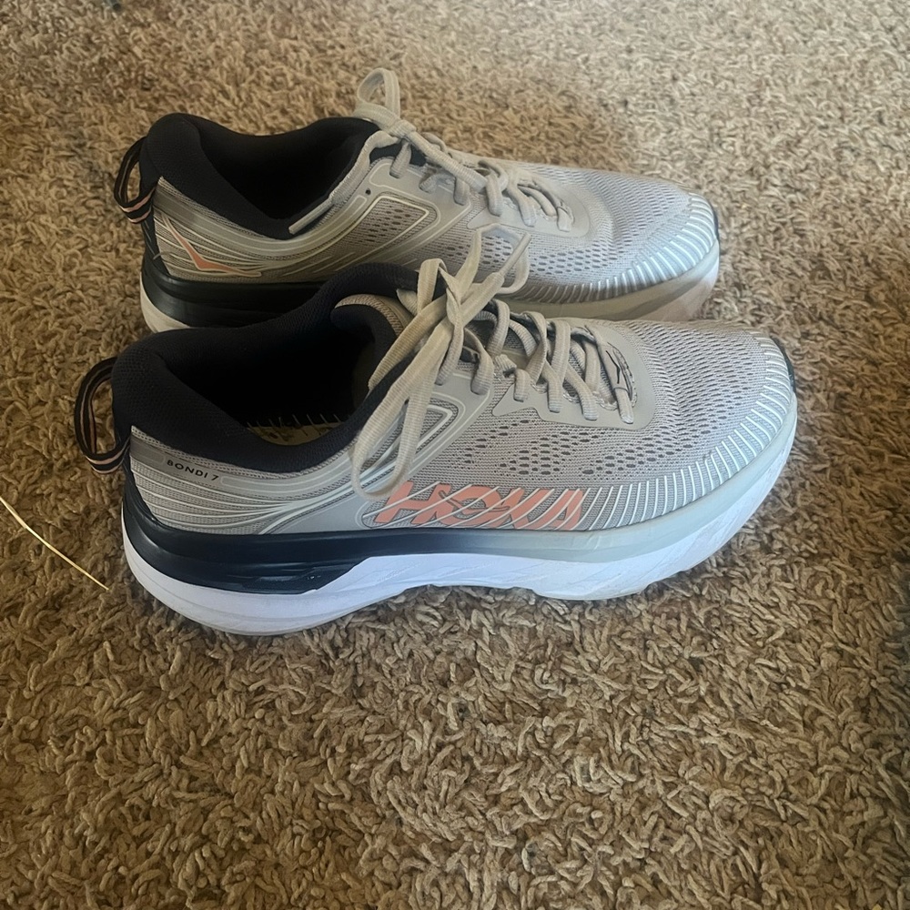Size 7 white and grey Hoka running shoes
